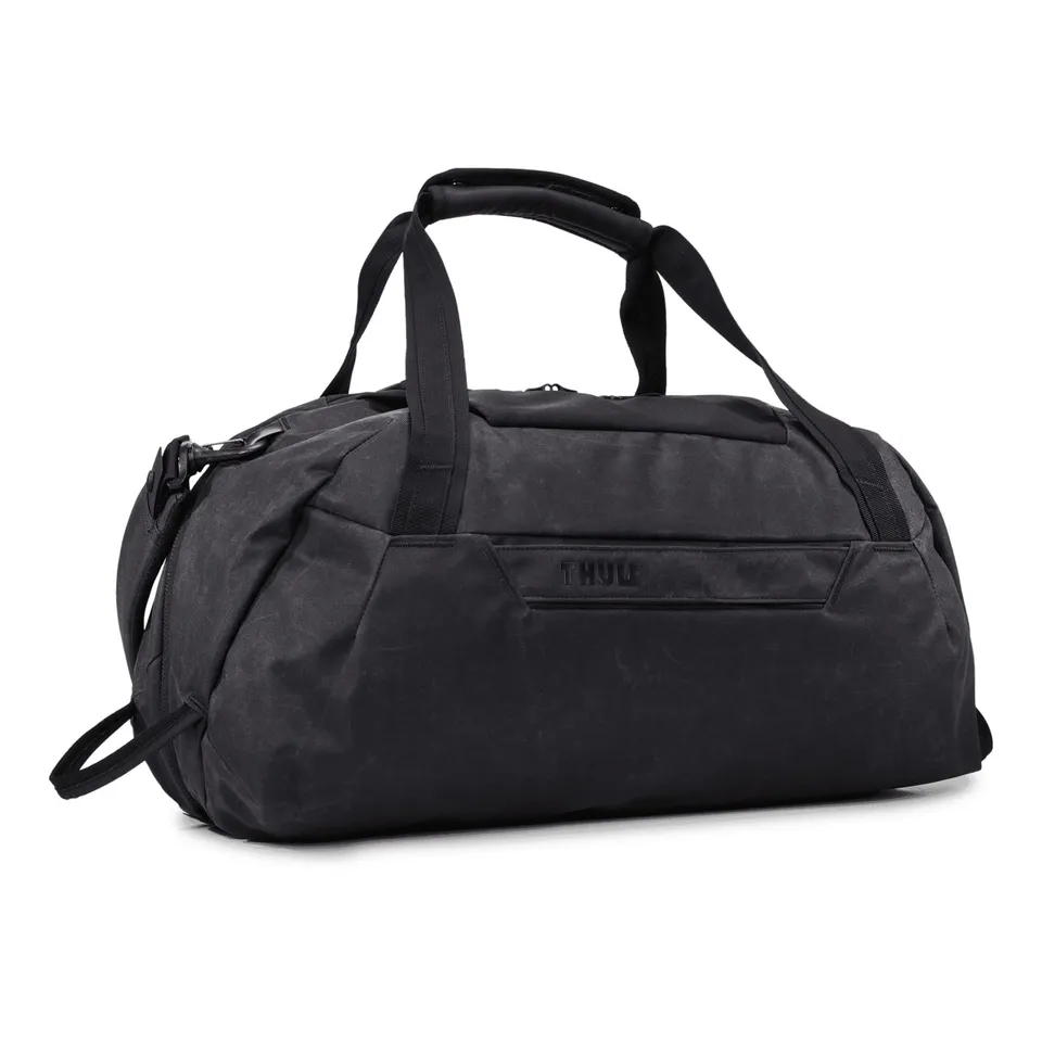 thule-aion-duffel-bag-35l-waxed-canvas-carry-on-with-split-packing-and-laptop-pr image 1