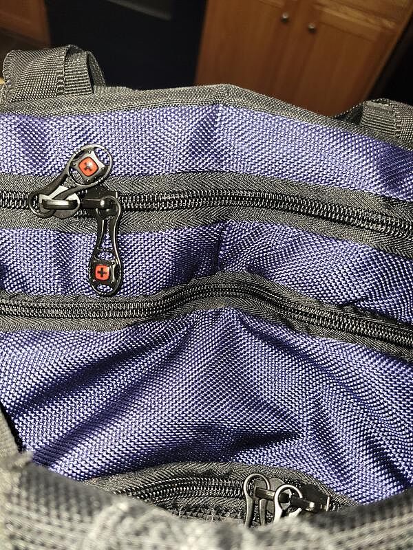 Good backpack, but side pocket is tight